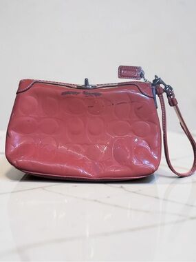 Coach Wristlet -  medium size - Orange - Hang Tag And Lock Top (see Scuff Marks